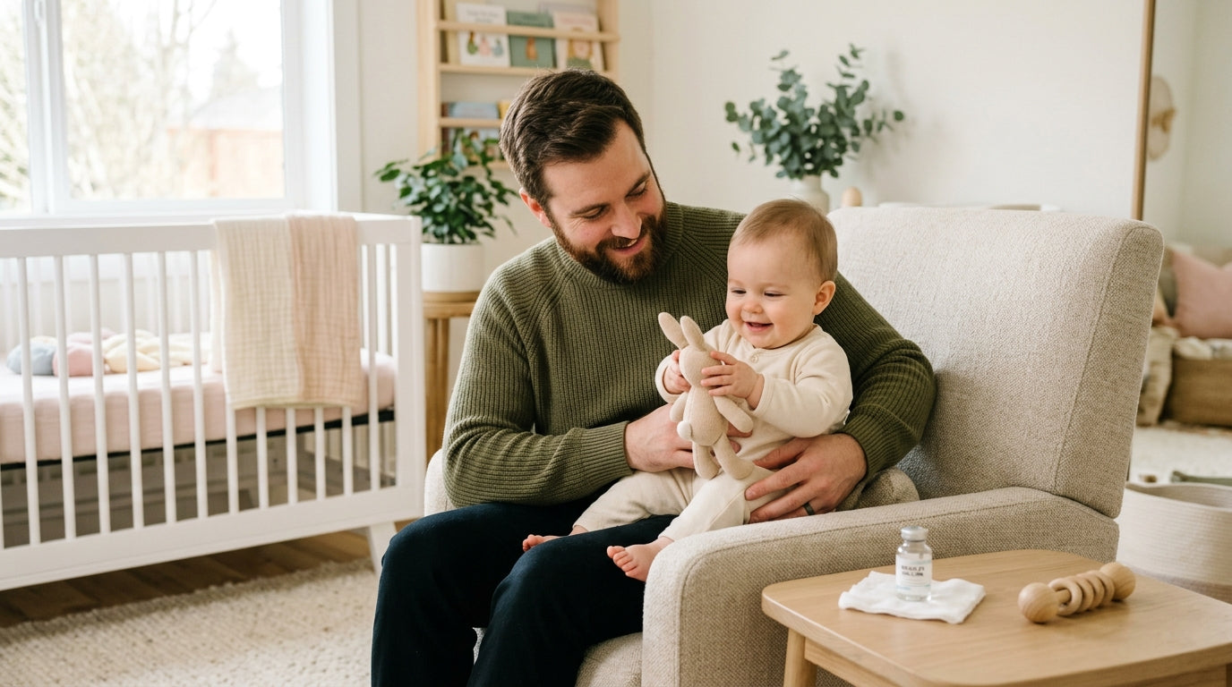 Portland dad looking at a baby immunization schedule on a smartphone