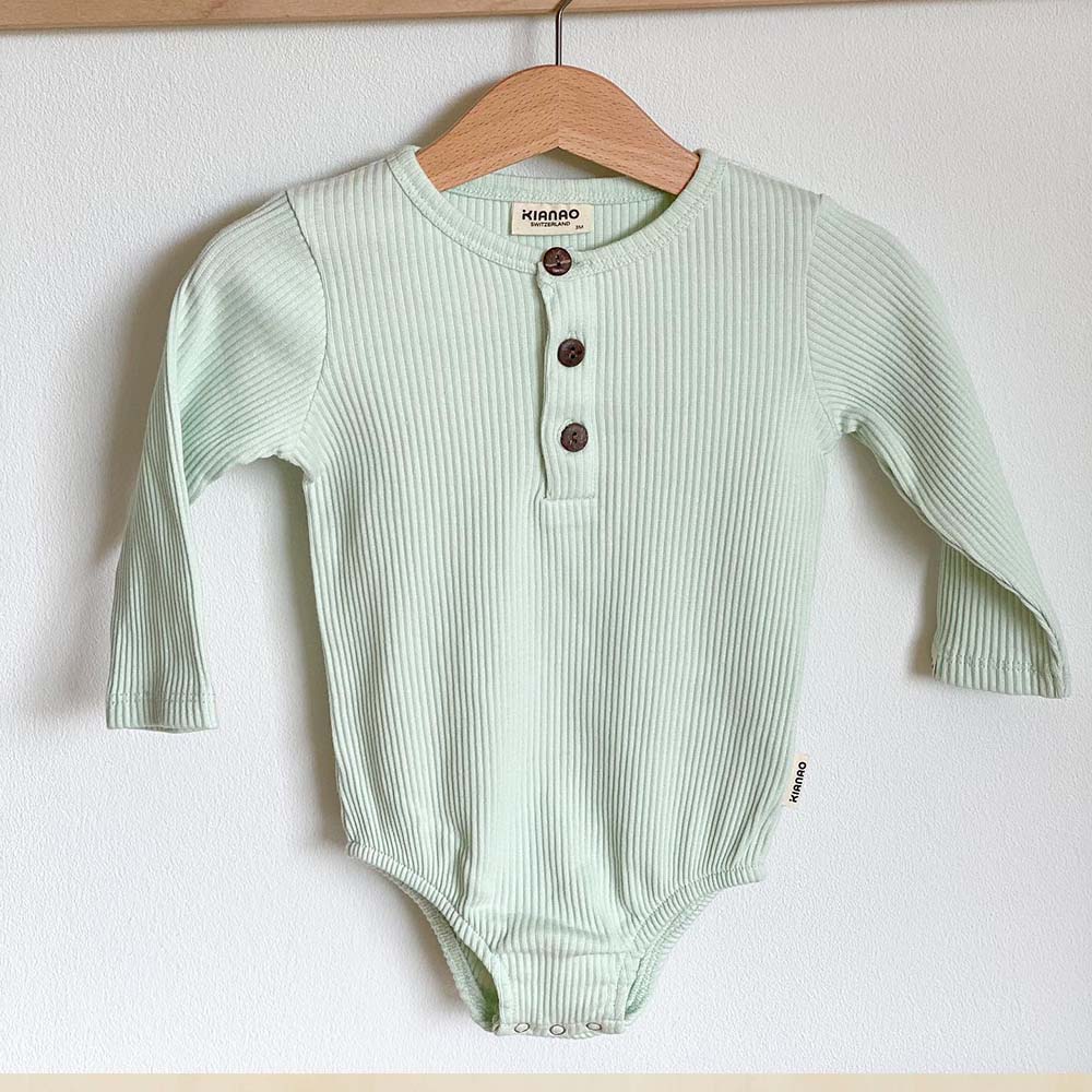 Collection of premium bodysuits & one-pieces featuring quality designs for babies and toddlers made with soft, comfortable, safe materials