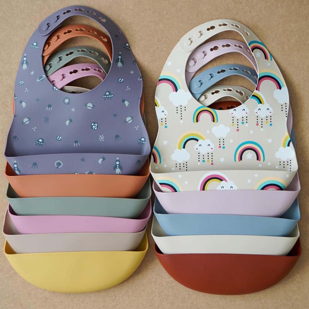 Collection of premium baby bibs featuring quality designs for babies and toddlers designed for convenient, mess-free mealtimes