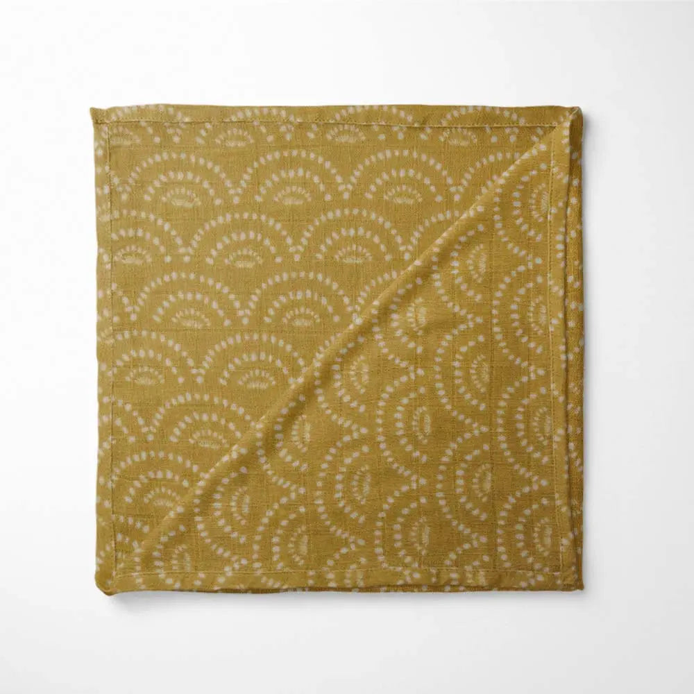 Folded Vibrant Rainbow infinite bamboo baby blanket with ultra-soft fabric - hypoallergenic and eco-friendly design.