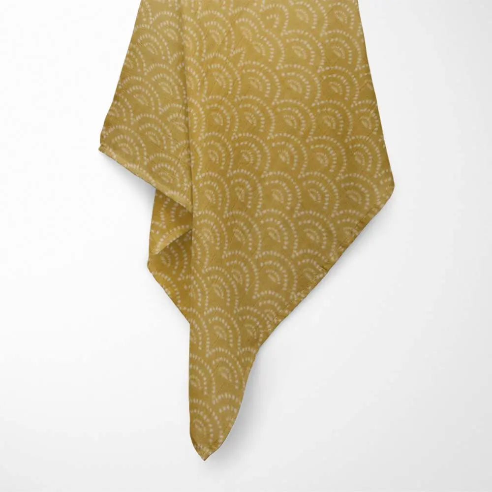 Hanging Vibrant Rainbow infinite bamboo baby blanket with ultra-soft fabric - hypoallergenic and eco-friendly design.