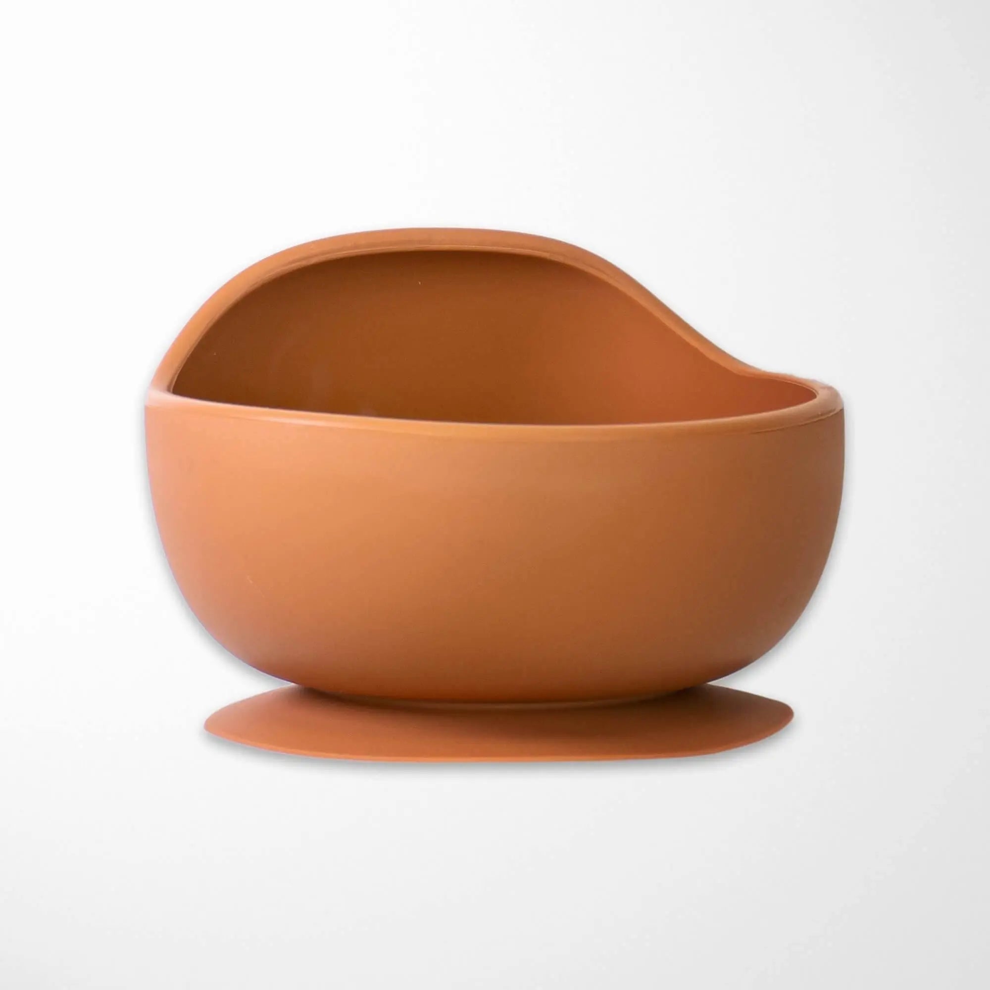 beige rotten silicone baby bowl with suction base, featuring soft rounded edges and ergonomic design for toddler meals