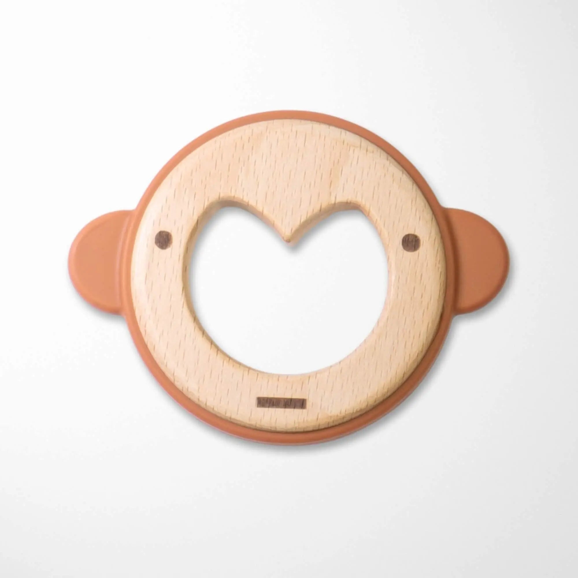 beige rotten wooden monkey baby teether with tan silicone ears and heart-shaped design for comfortable teething relief