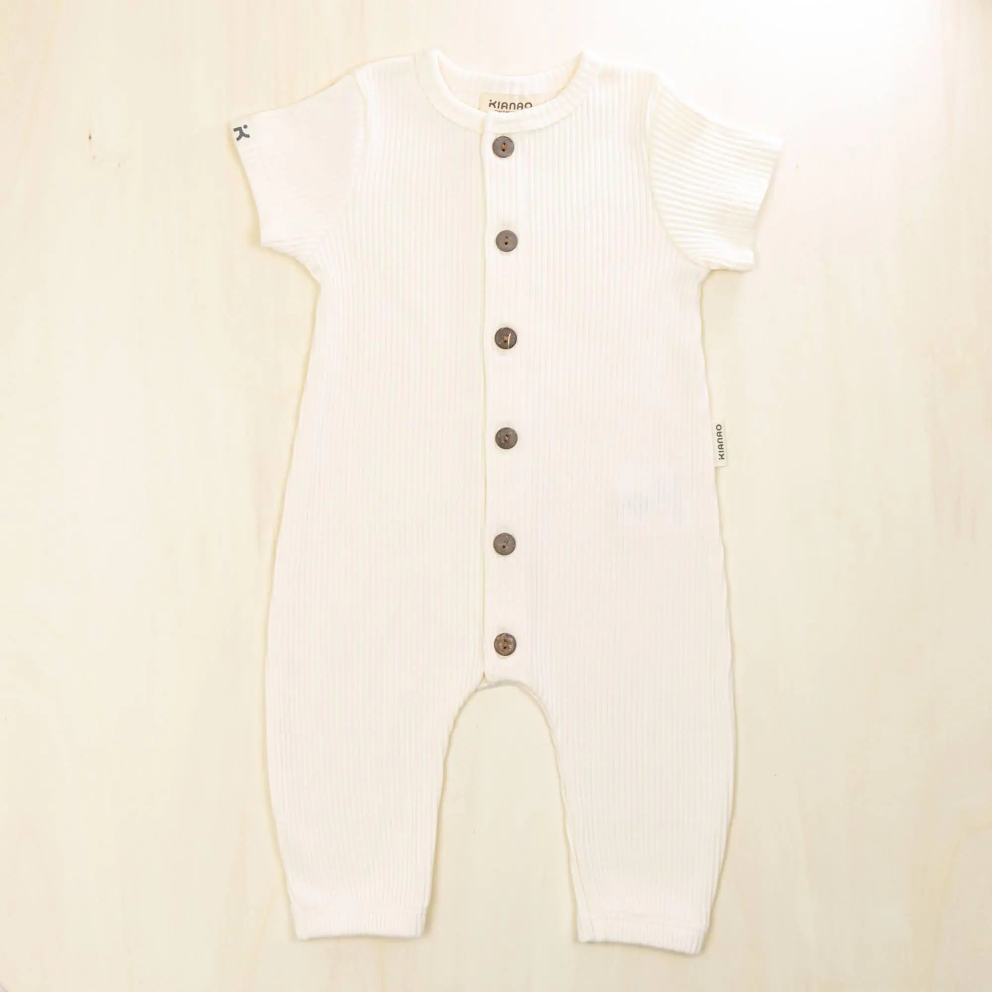 blossom white baby jumpsuit in 100% organic cotton, soft breathable baby clothes for everyday wear