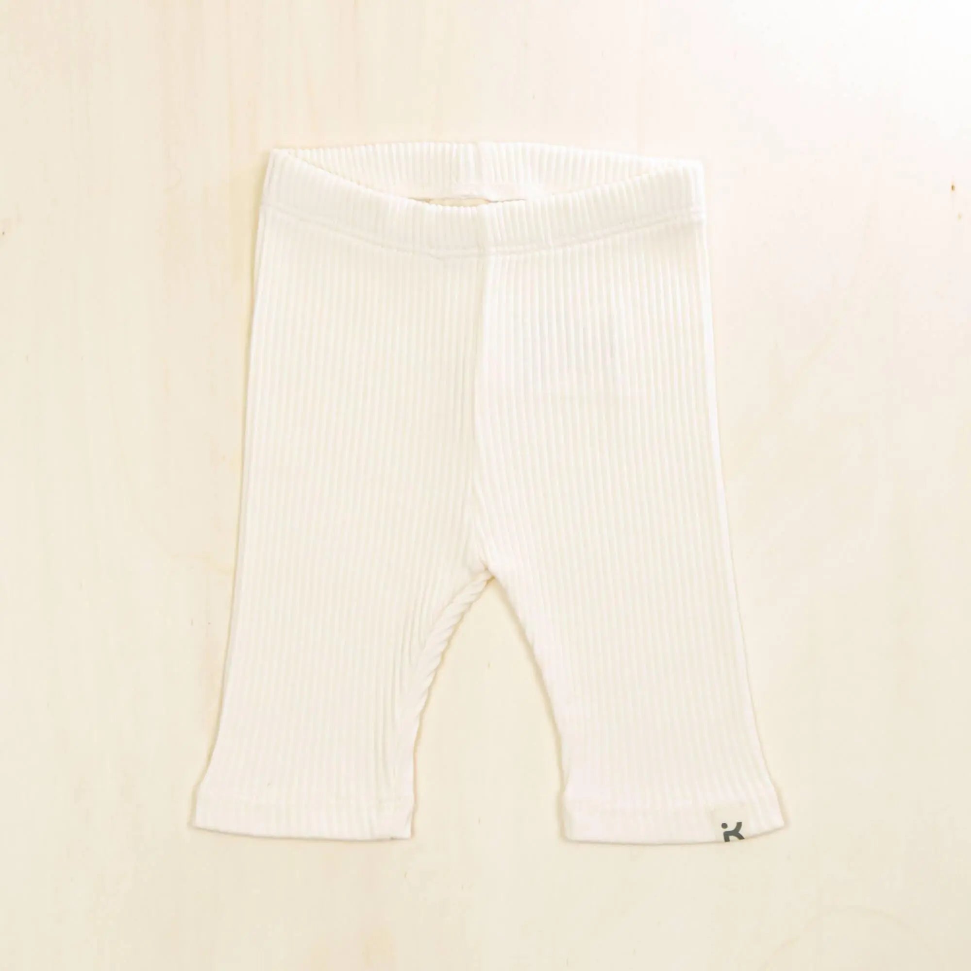 blossom white baby leggings in hypoallergenic organic cotton, stretchy ribbed baby pants for sensitive skin