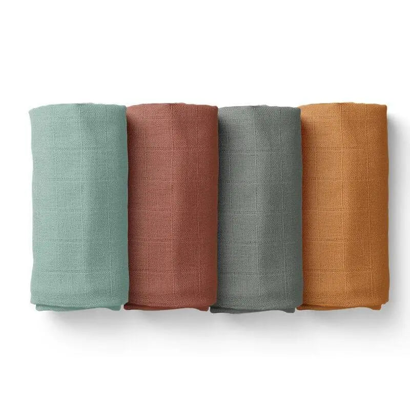 four bamboo baby blanket with soft grid texture rolled, showcasing the natural organic fabric