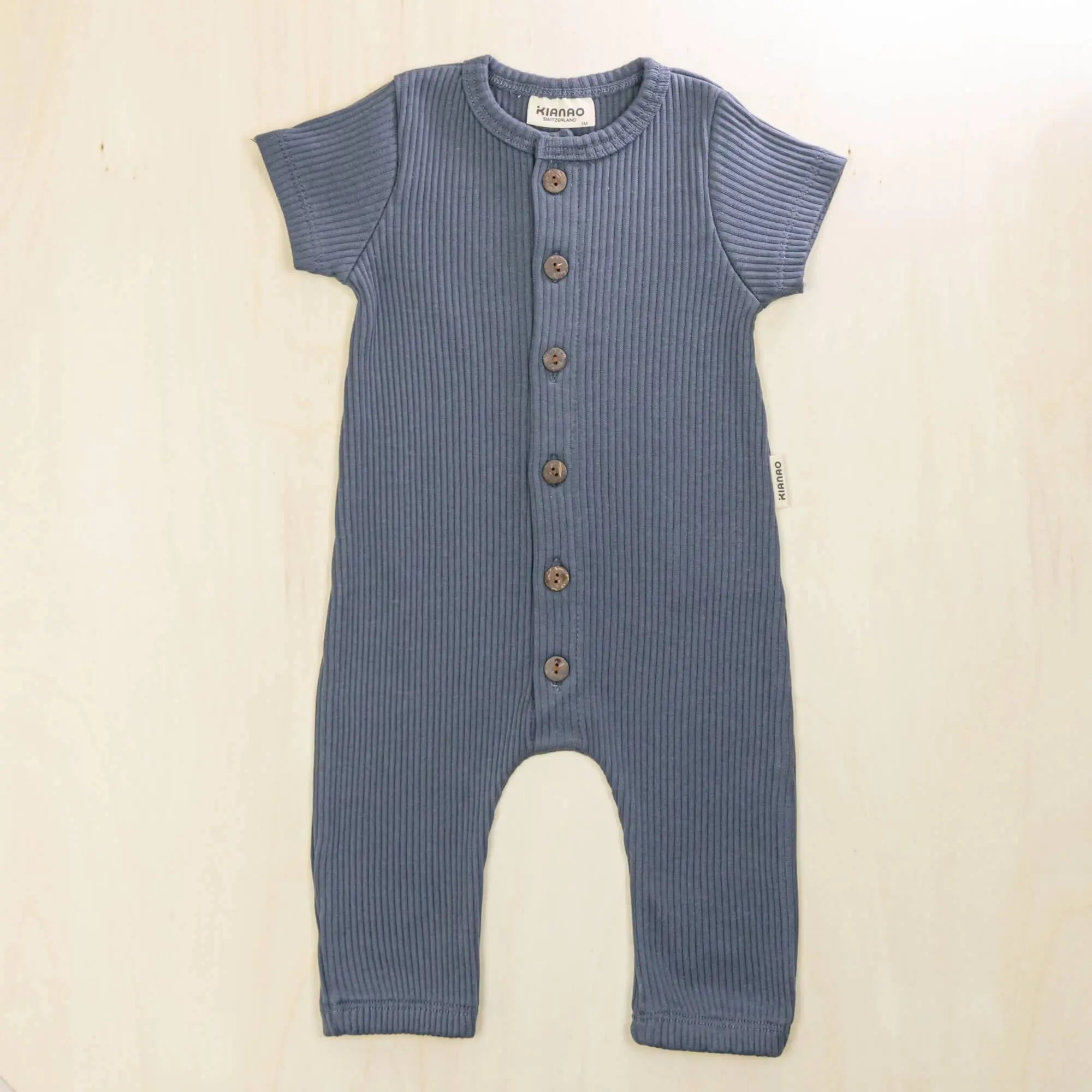indigo blue baby jumpsuit featuring gentle elastic ankles, breathable organic cotton baby clothes