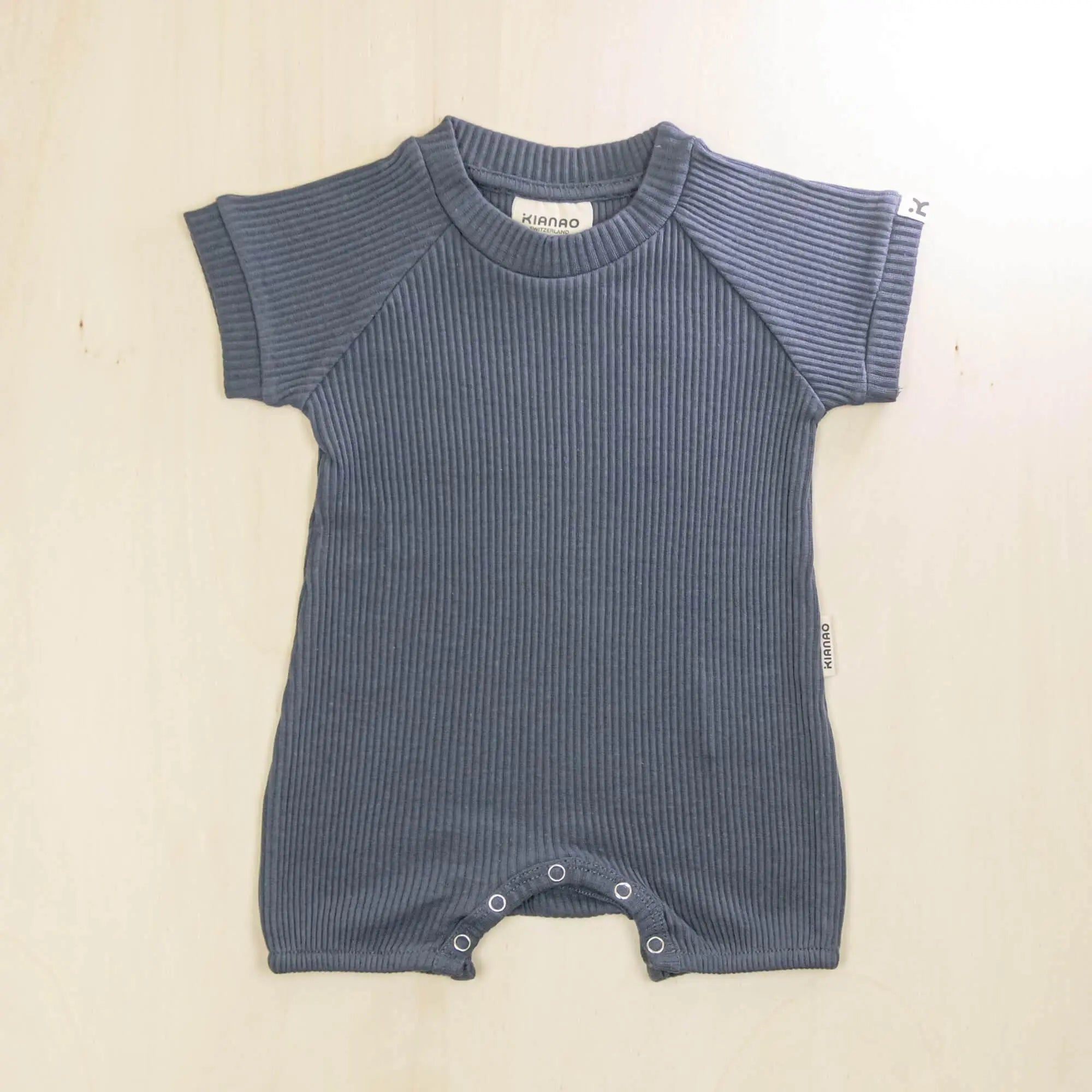 indigo blue organic cotton short sleeve romper with soft fabric ideal for sensitive skin