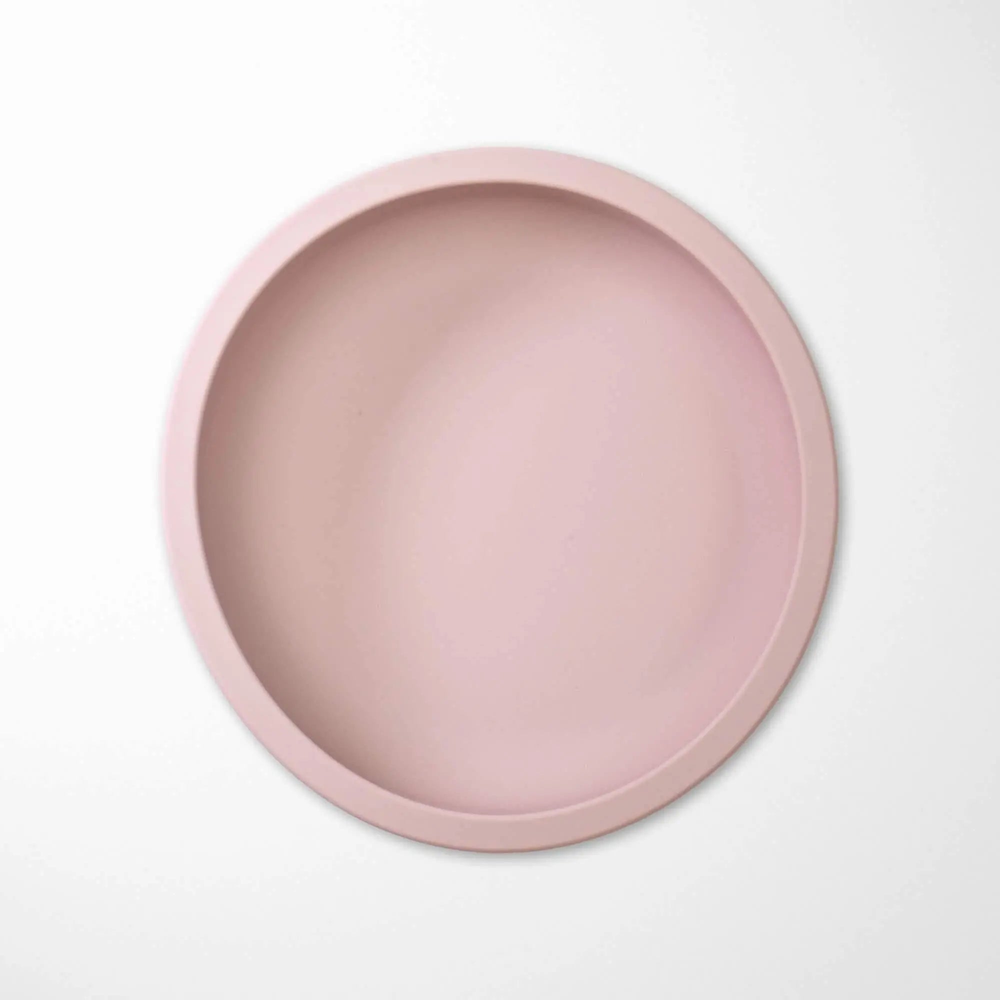 light pink baby feeding bowl with strong suction base, made of BPA-free silicone for safe mealtimes