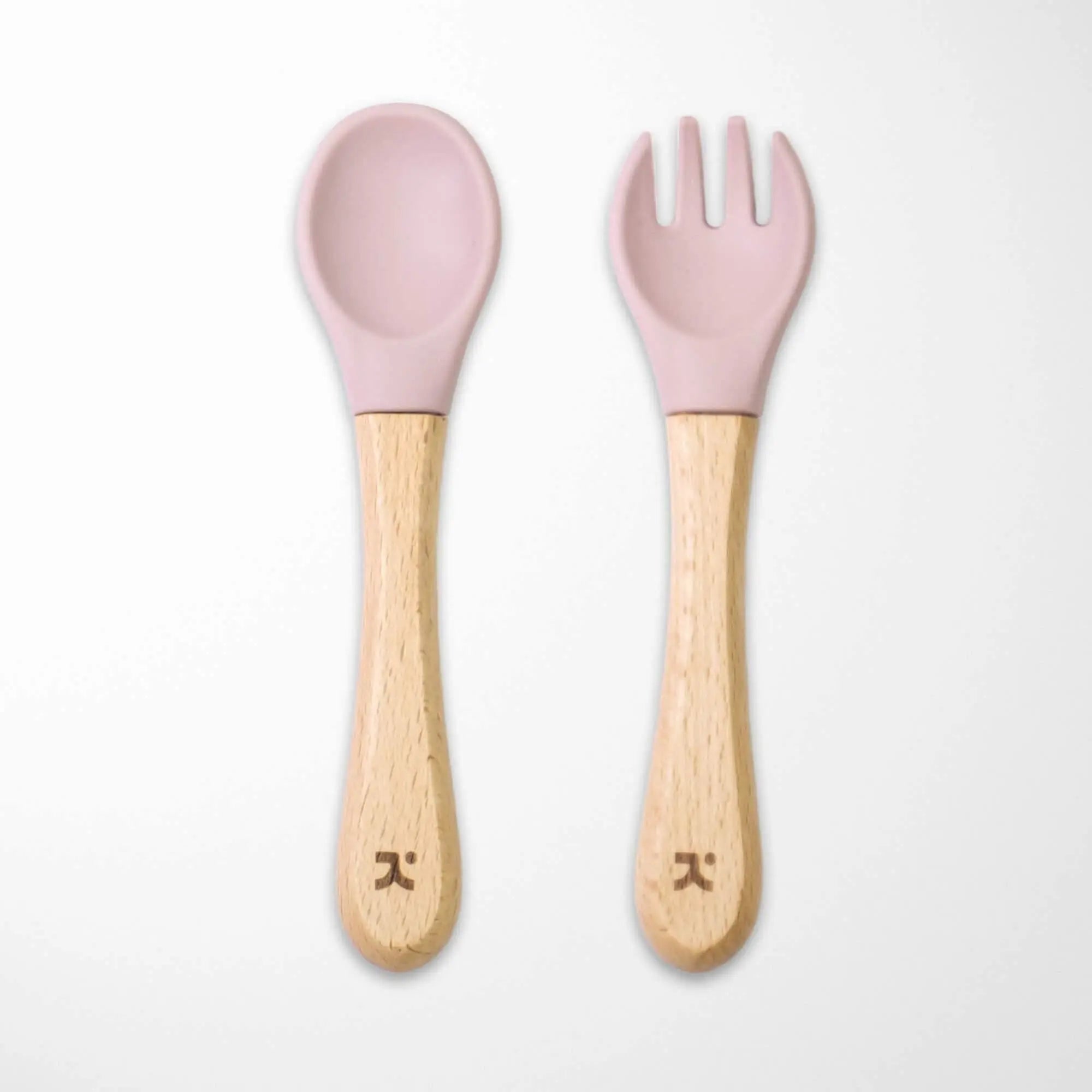 light pink silicone-tipped bamboo baby spoon and fork set with sustainable wooden handles for eco-conscious feeding