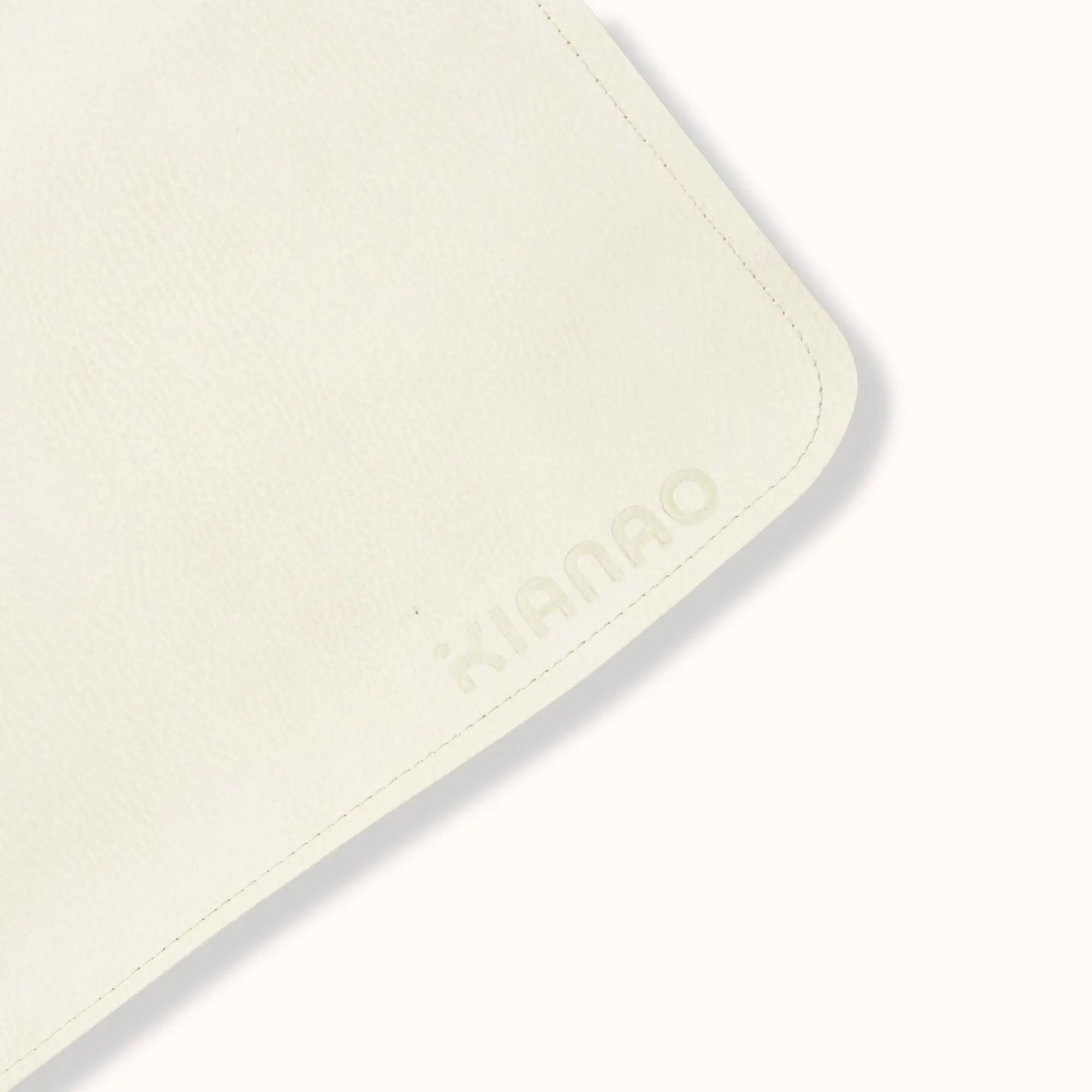 baby sitting on oat cream waterproof play mat with non-slip backing, showing generous 54x54 inch playing surface