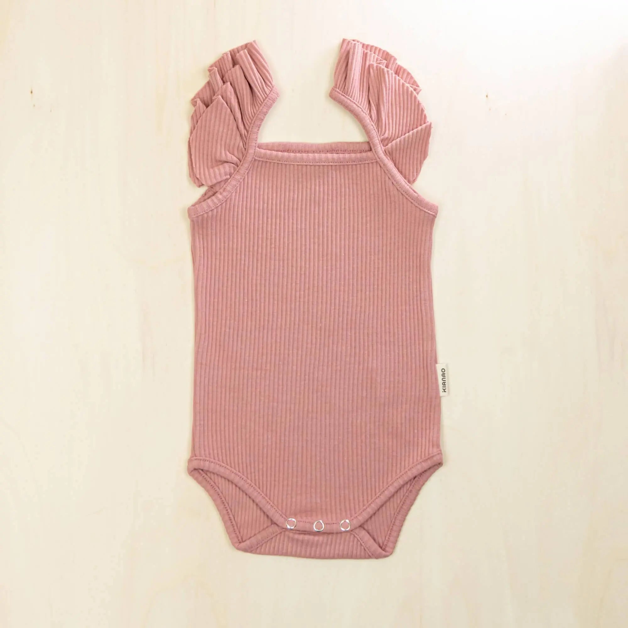 old rose flutter sleeve organic cotton baby bodysuit with delicate ruffles and secure snap closures