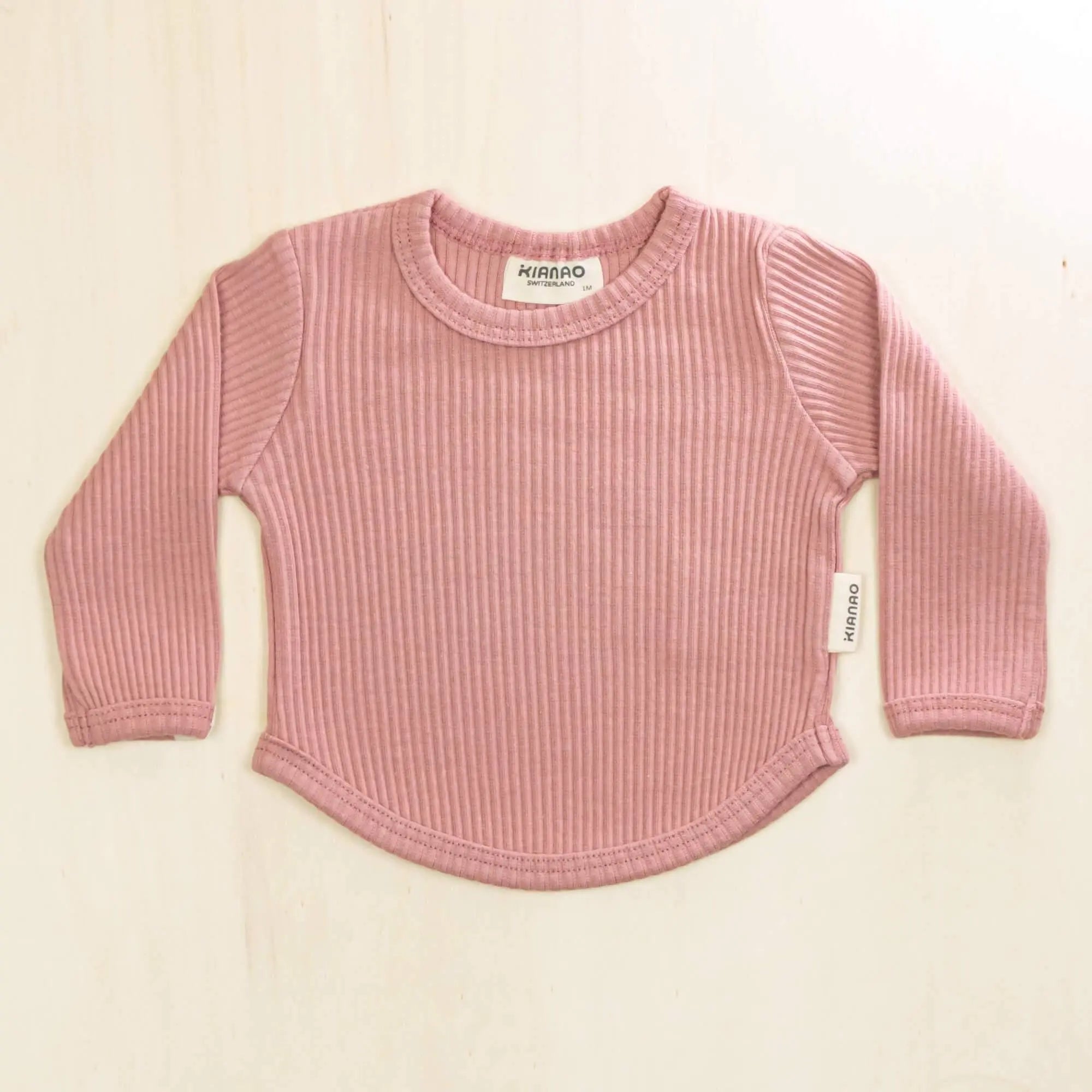 old rose organic cotton baby shirt with ribbed texture and long sleeves, comfortable stretch fit for growing babies
