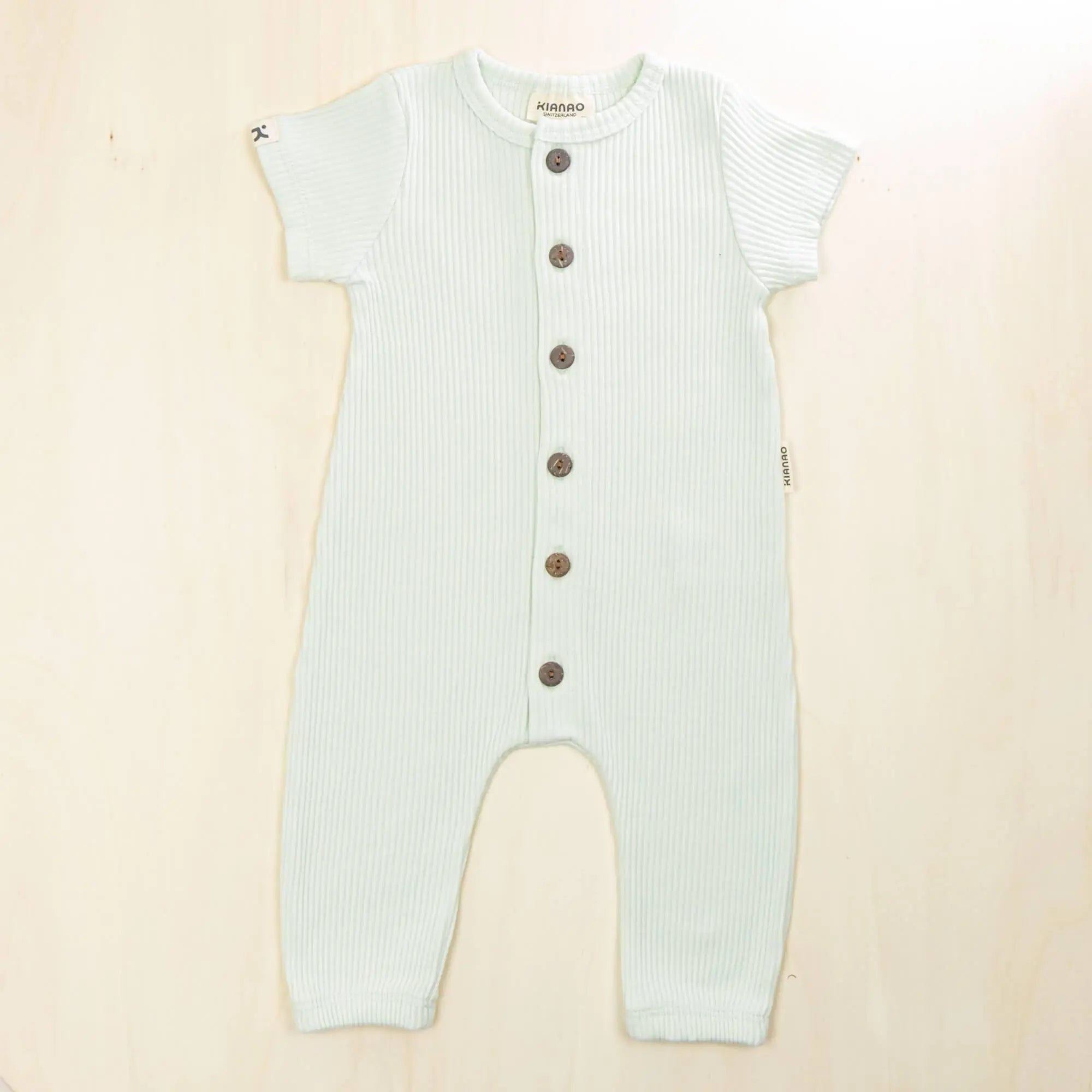 pale turquoise baby jumpsuit showcasing easy-change design, organic cotton baby clothes for comfort