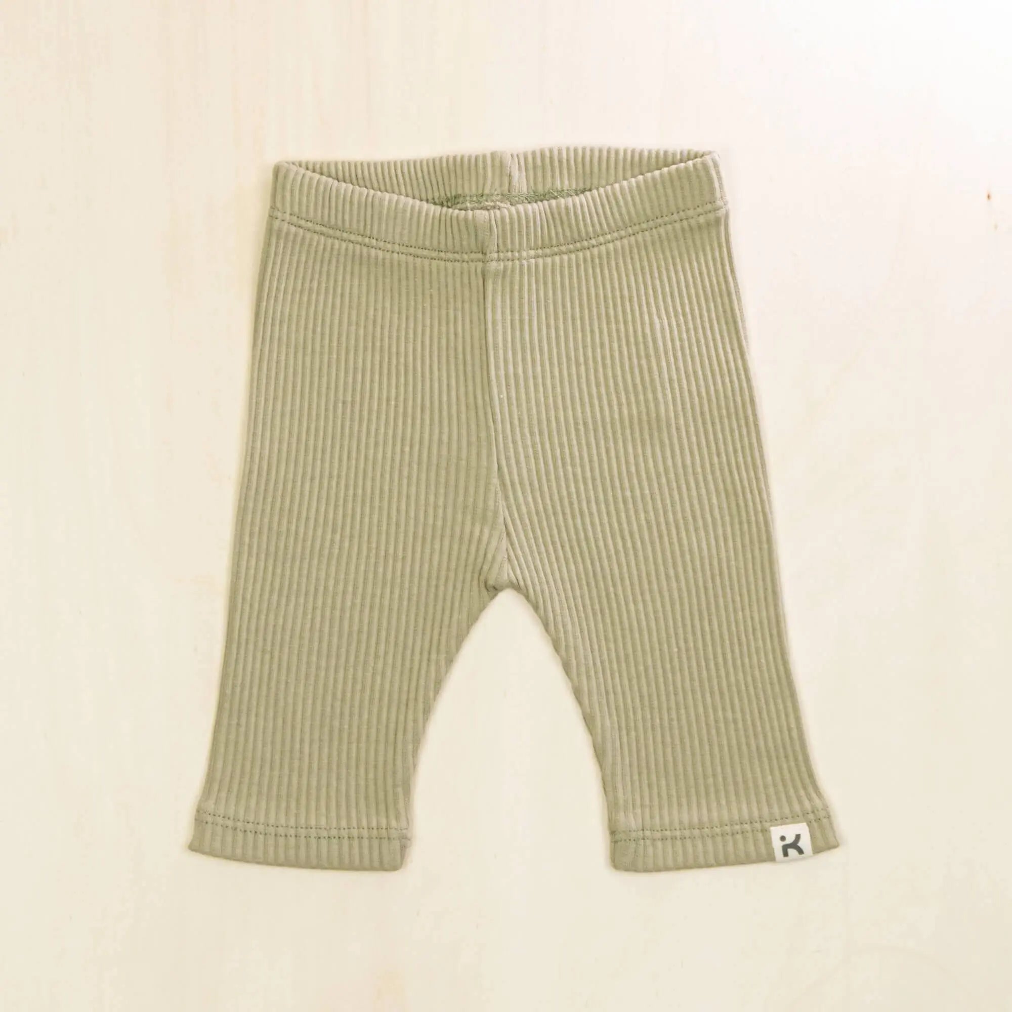 sage green baby leggings featuring soft ribbed organic cotton, comfortable baby pants for crawling and exploring
