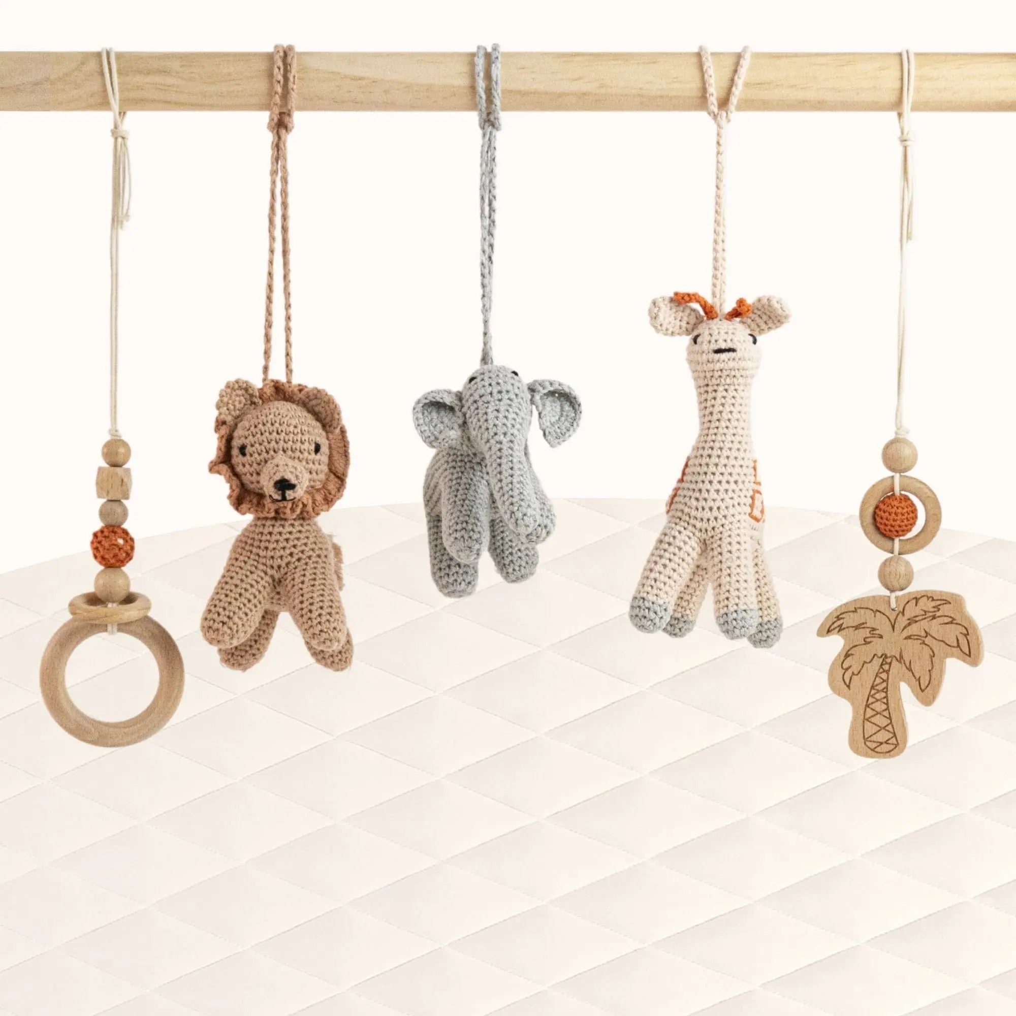 Front view of Wild Jungle Play Gym with all safari animal toys visible showing jungle-inspired theme