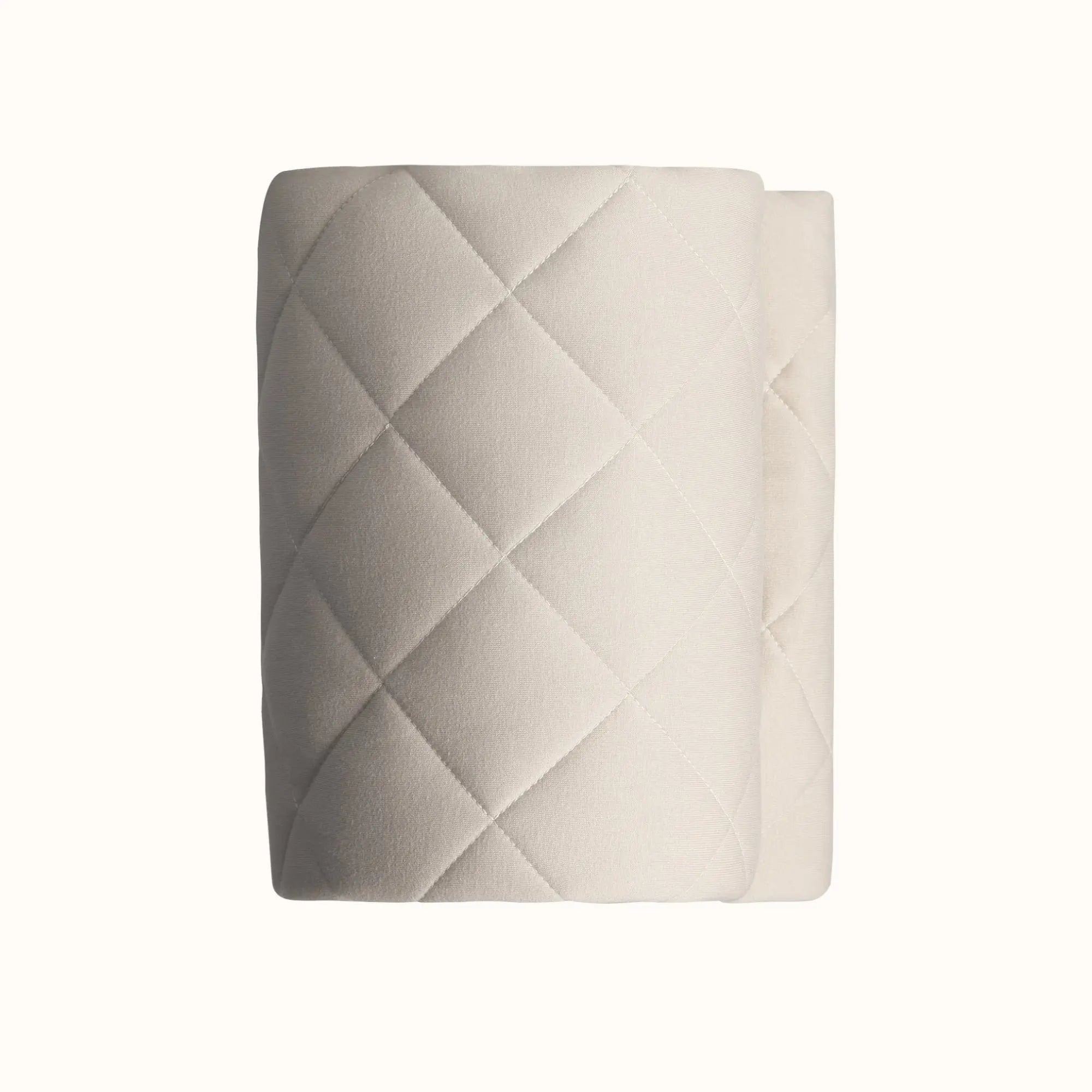 Detailed view of grey quilted vegan playmat texture showing soft surface for comfortable prairie adventures