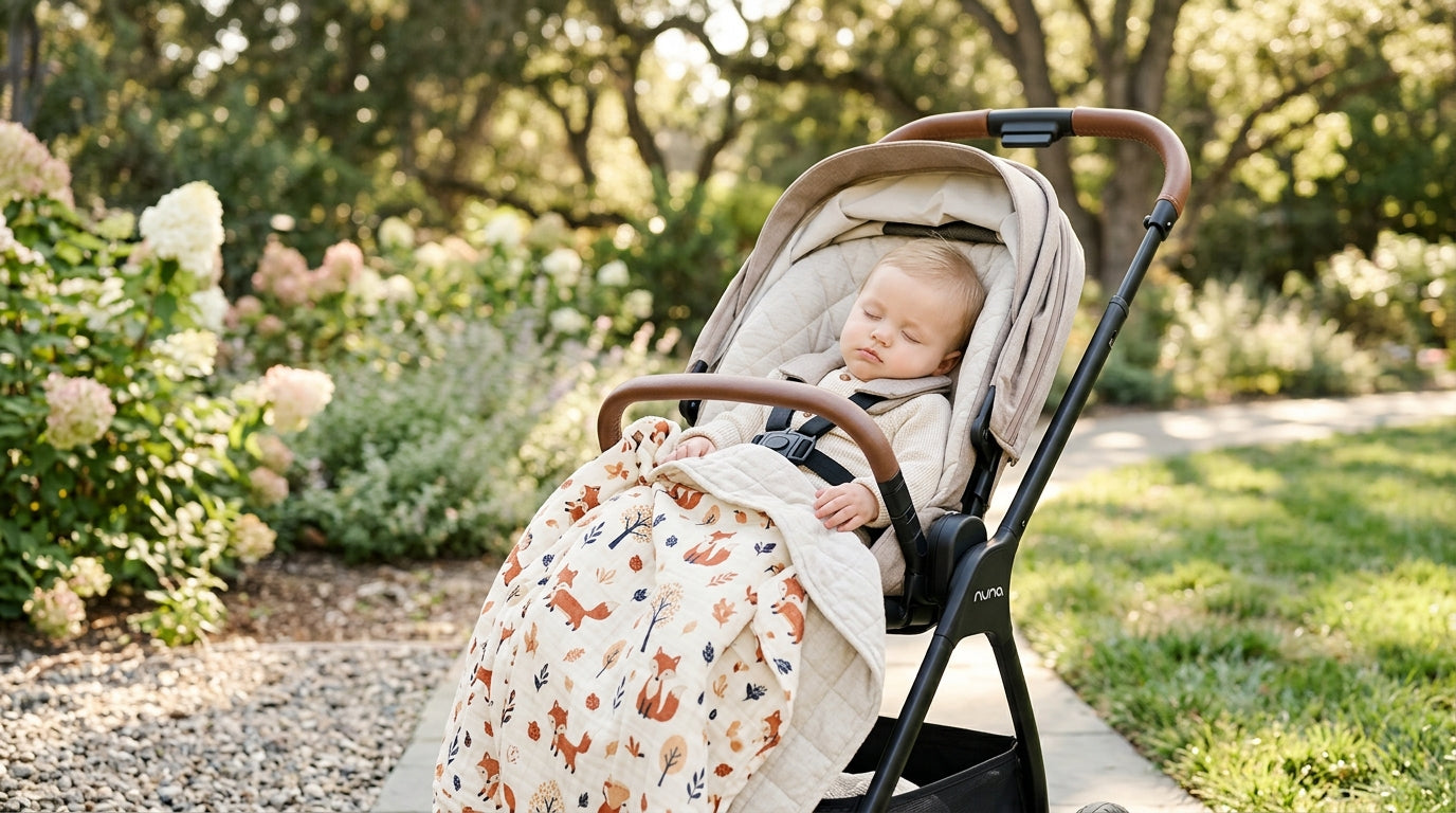Portland dad holding an orange woodland blanket while looking at his phone