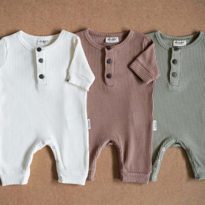 three colored bodysuits rompers for newborns