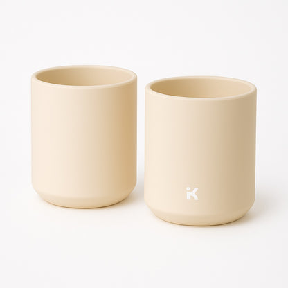 Texture detail of Pearl Beige silicone mug showing the BPA-free material, safe for babies and toddlers