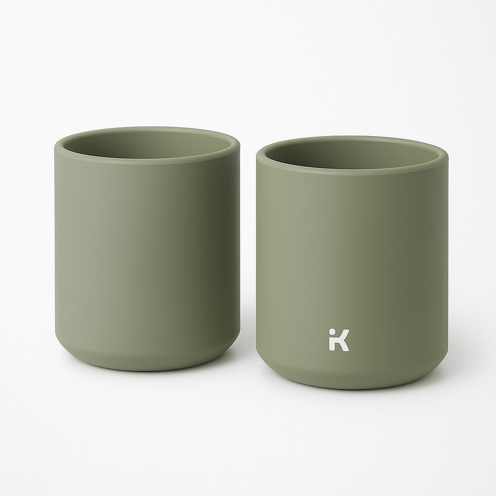 Detail of Sage Green silicone mug showing the stability features and gentle rounded edges for toddler safety