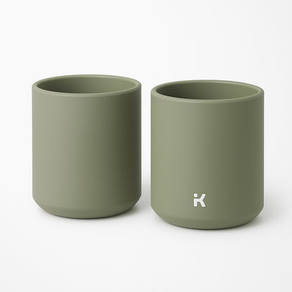 Detail of Sage Green silicone mug showing the stability features and gentle rounded edges for toddler safety