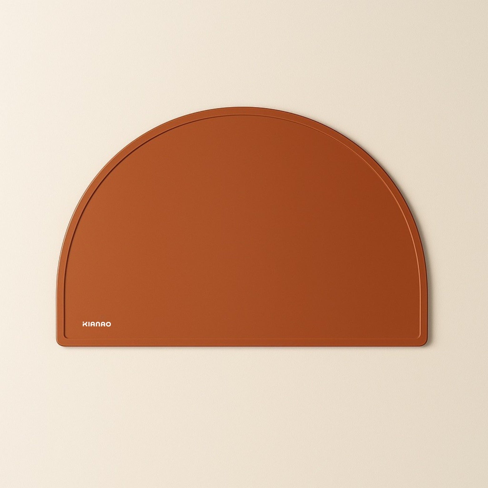 Beige Rotten silicone placemat with practical half-circle shape and smooth surface that wipes clean easily