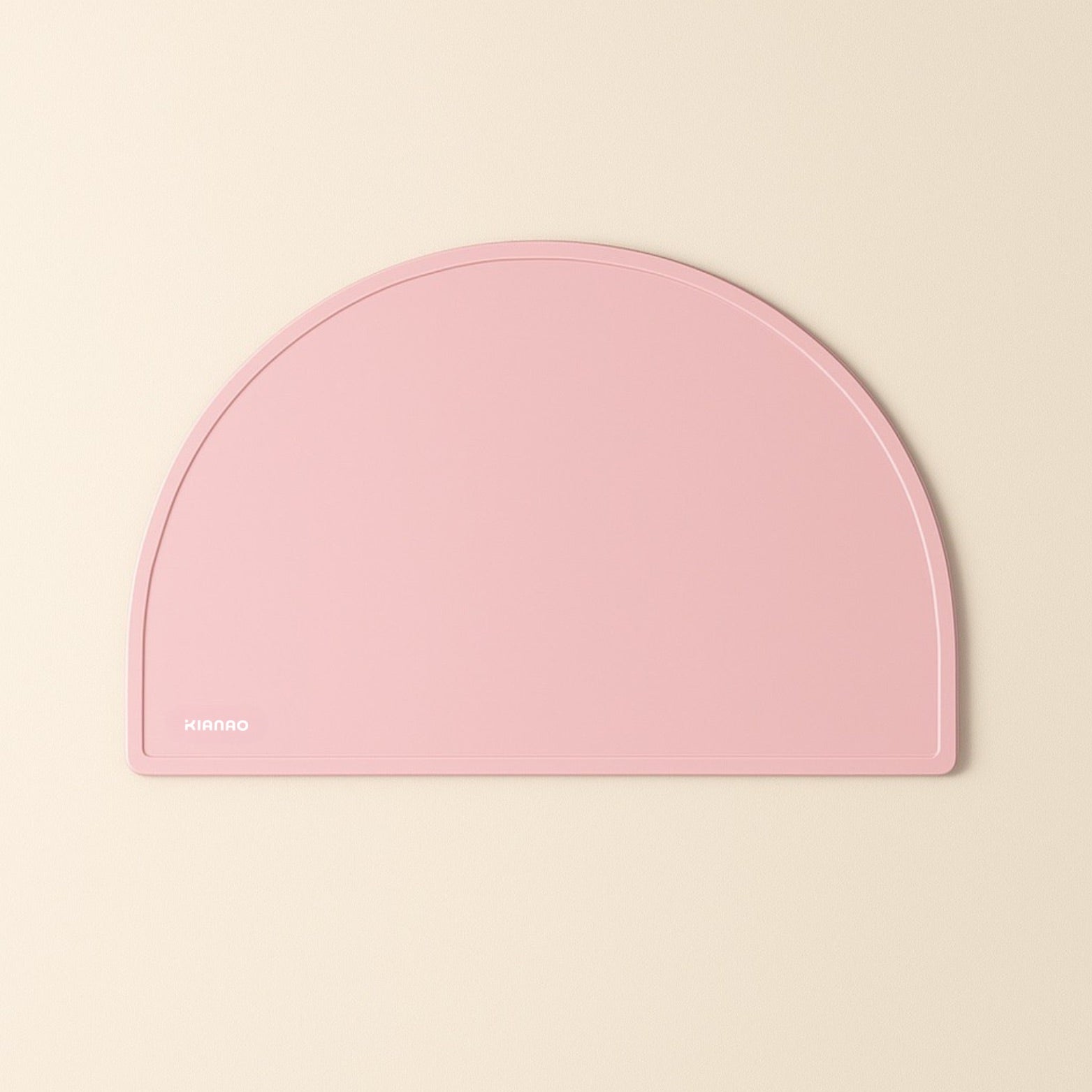 Light Pink silicone placemat with contemporary design and raised border to contain food and liquid spills