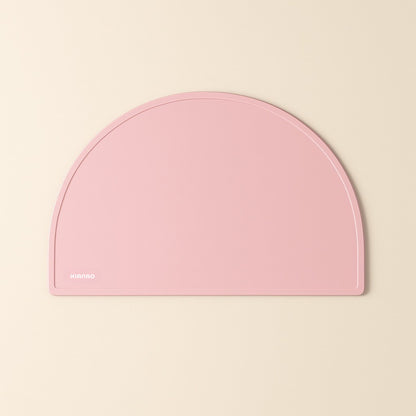 Light Pink silicone placemat with contemporary design and raised border to contain food and liquid spills