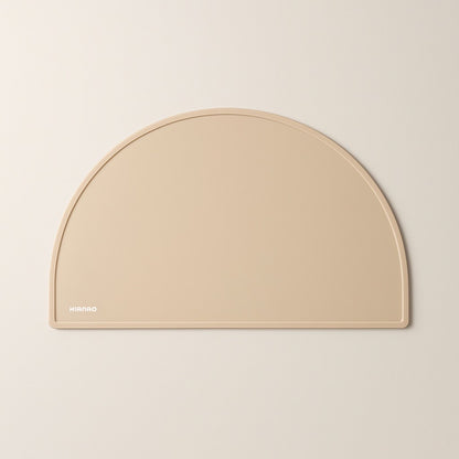 Pearl Beige silicone placemat with half-circle design, raised edges and non-slip surface for mess-free meals