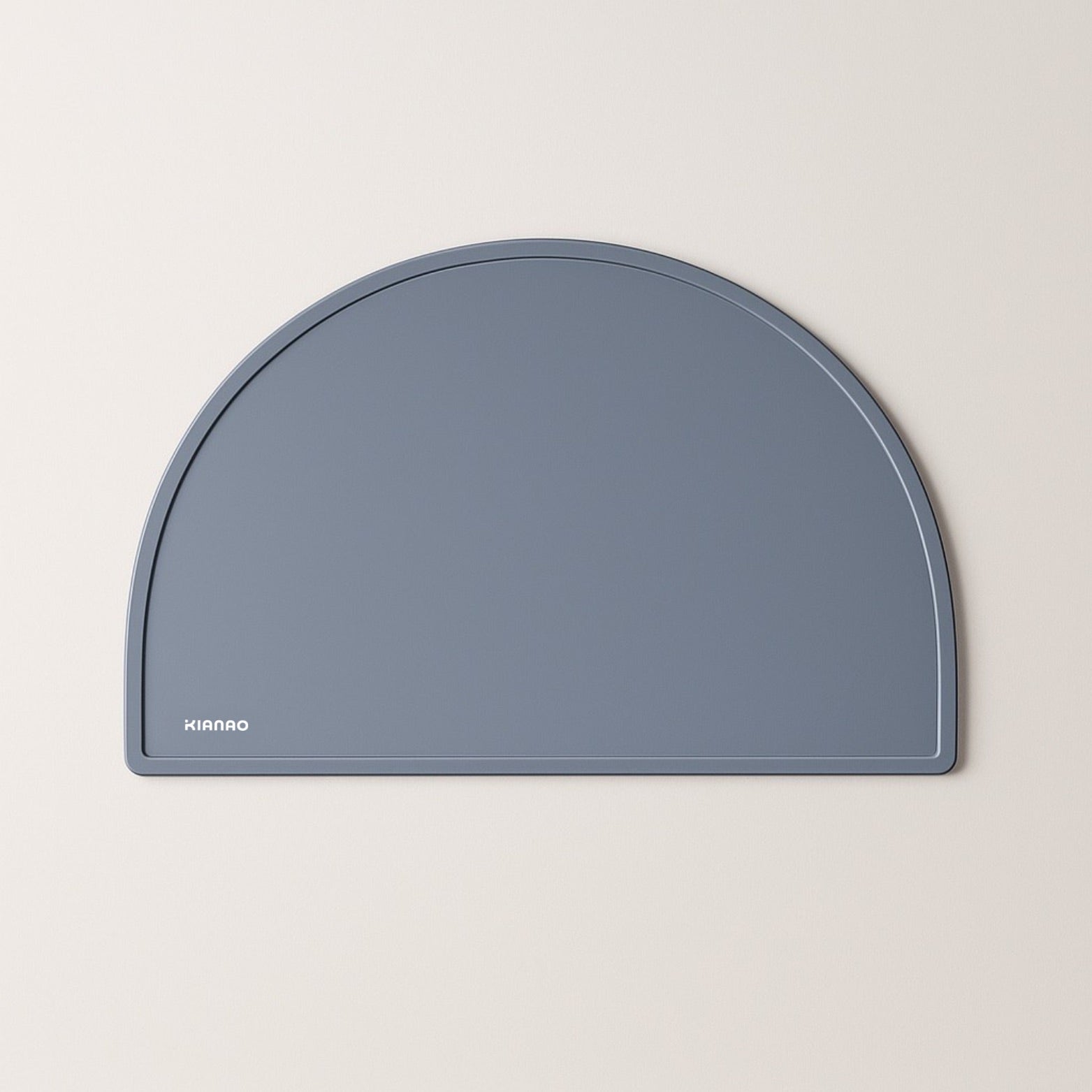 Slate Gray silicone placemat featuring minimalist half-circle shape and spill-containing raised edges