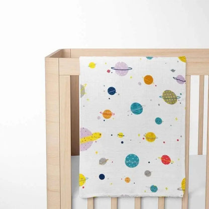 Close-up of Colored Universe pattern on bamboo baby blanket - visually stimulating celestial design promotes development