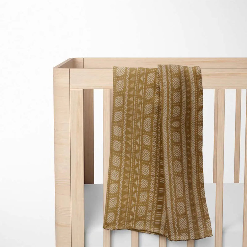On bed Chakra Bamboo Baby Blanket with ultra-soft bamboo fabric - balanced, hypoallergenic and eco-friendly design