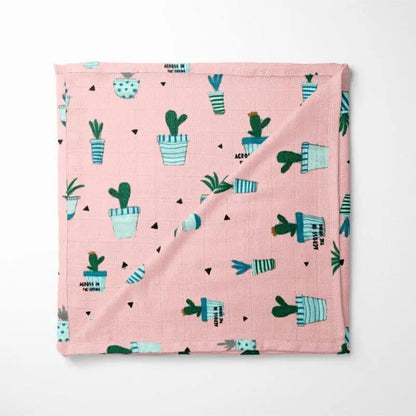 Pink organic cotton baby blanket with blue and green cactus pattern - GOTS certified chemical-free fabric for sensitive skin