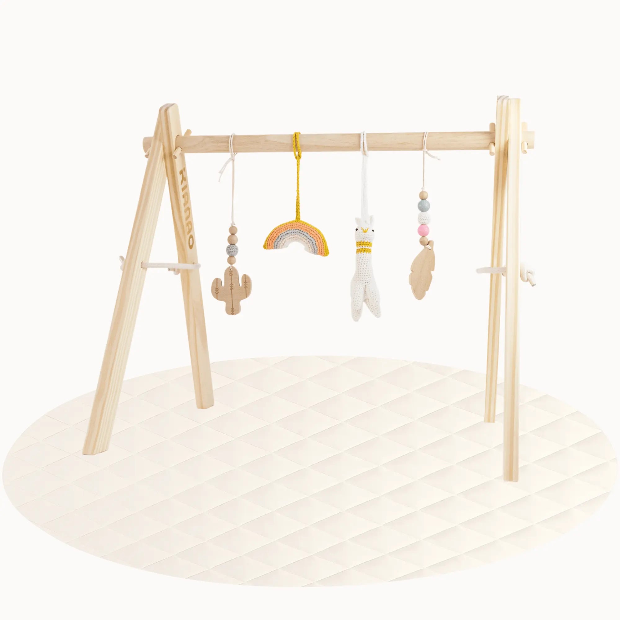 Side view of wooden Alpaca Play Gym showing A-frame structure with hanging Southwestern-themed toys