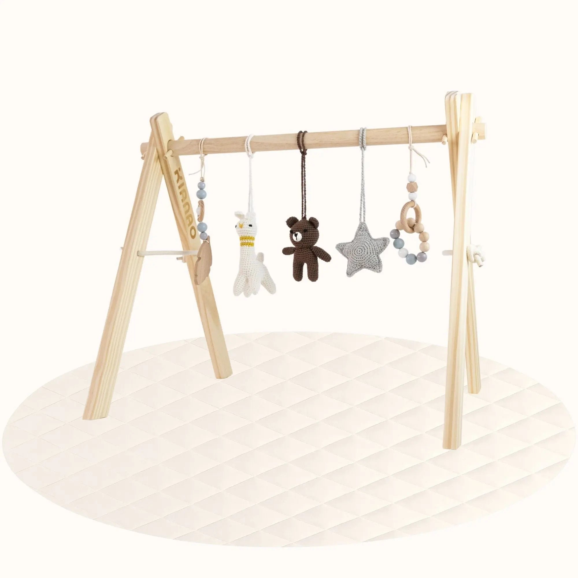 Side view of wooden Bear and Lama Play Gym showing A-frame structure with hanging character toys