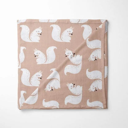 beige organic cotton baby blanket with white squirrel print pattern featuring double-layered fabric for comfort and warmth