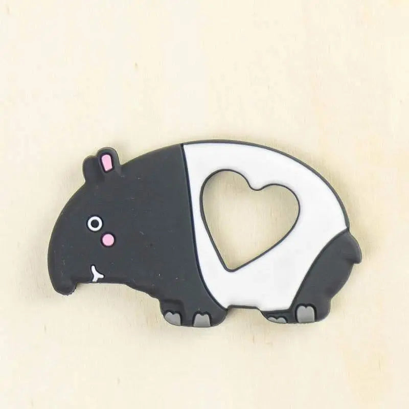 black and white malaysian tapir silicone baby teether with heart-shaped cutout design for infant teething relief and wildlife education
