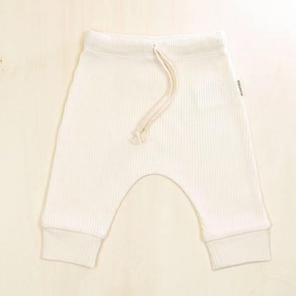 blossom white baby pants in hypoallergenic organic cotton, ribbed texture with adjustable drawstring for customized fit