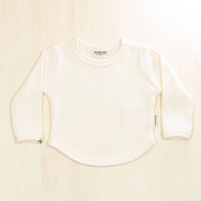blossom white organic cotton baby shirt with ribbed texture and long sleeves, pure organic material that's gentle on skin