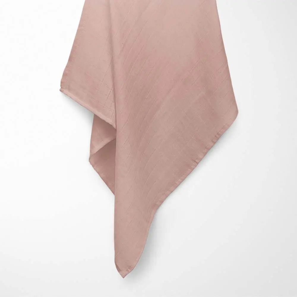 brick red close-up of amber bamboo baby blanket weave, showcasing the breathable texture and natural organic fibers