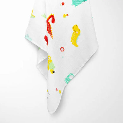 fully opened colorful dinosaur bamboo baby blanket displaying playful pattern with various dinosaur species in bright colors on breathable organic fabric