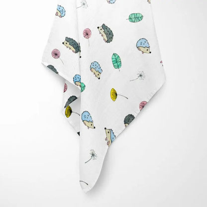 fully opened colorful hedgehog bamboo baby blanket displaying woodland pattern with cute hedgehogs in various colors on breathable organic fabric