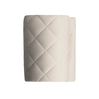 detailed view of cream round baby play mat showing quilted pattern and premium stitching