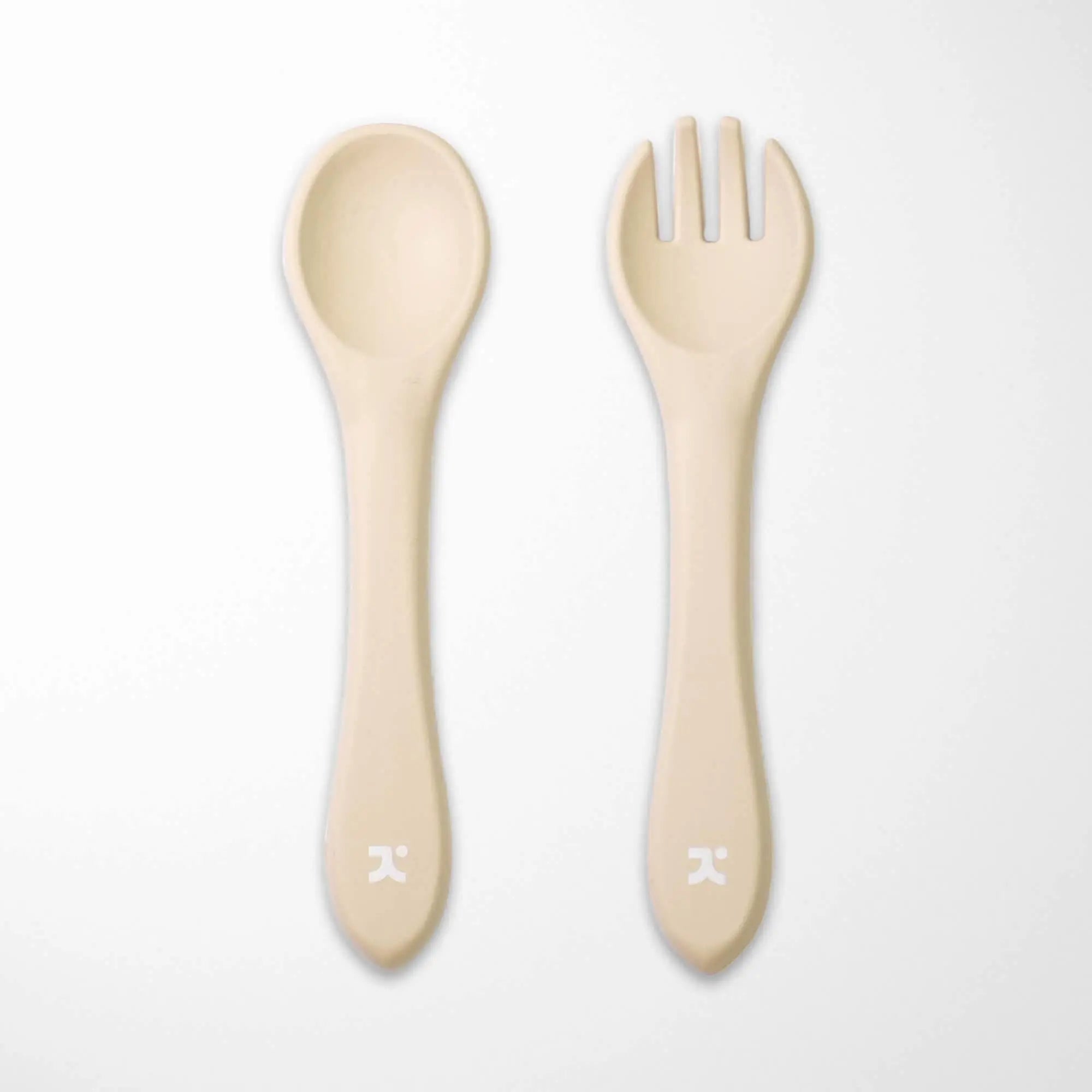 cream silicone baby spoon and fork set with food-grade material free from harmful chemicals