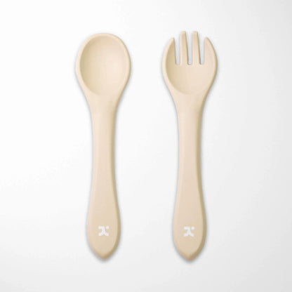 cream silicone baby spoon and fork set with food-grade material free from harmful chemicals