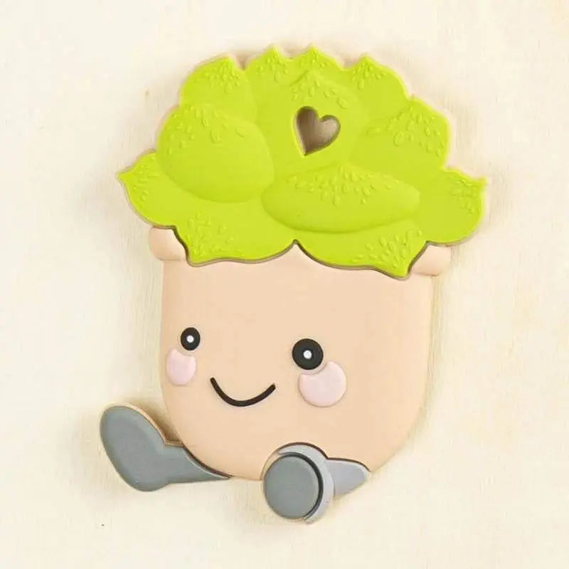 green silicone cactus baby teether with smiling face and beige pot design for soothing sore baby gums