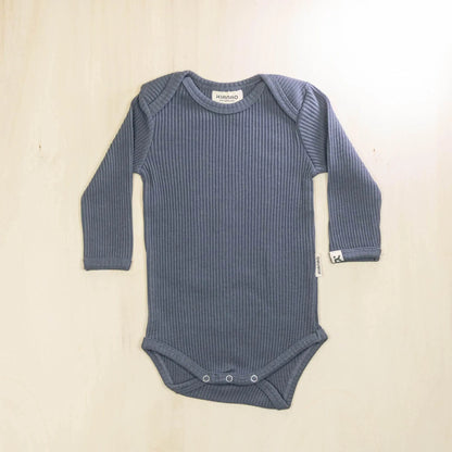 indigo blue long sleeve organic cotton baby bodysuit perfect for layering in all seasons