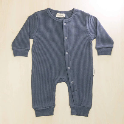indigo blue organic cotton baby romper with convenient front-button design for easy diaper changes