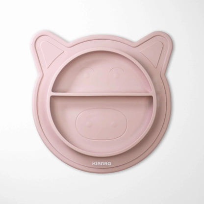 light pink silicone baby bowl with piglet design, divided sections and strong suction base for mess-free meals